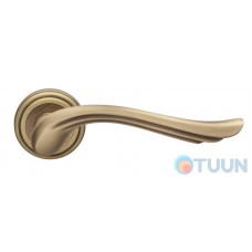Linea Cali handle, Aria, on 11 round rosette, patina