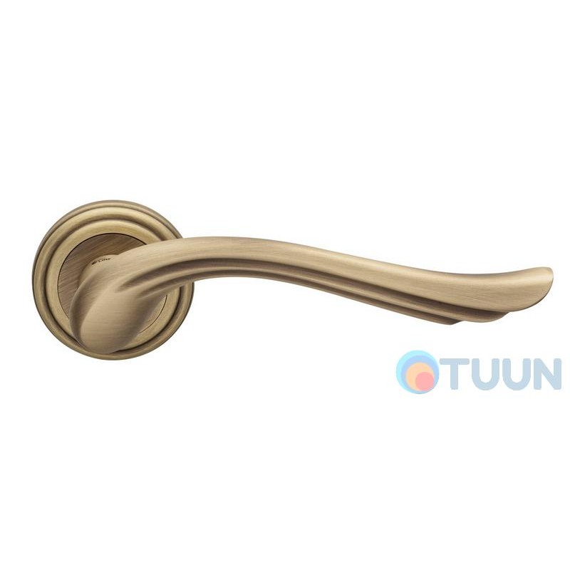 Linea Cali handle, Aria, on 11 round rosette, patina