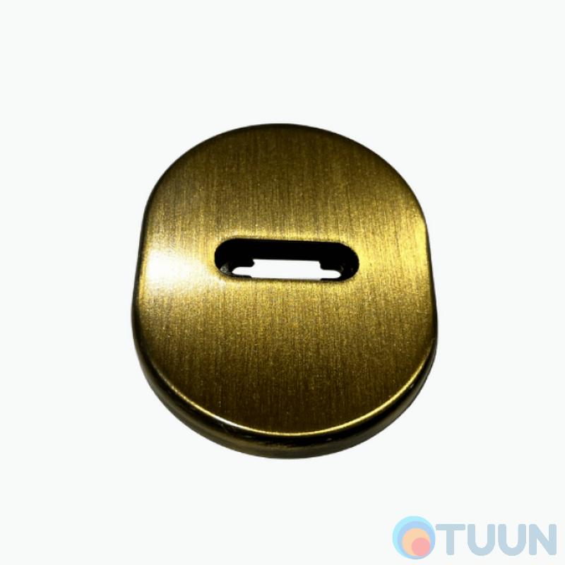 Cipierre, oval decorative cover for a key, bronze