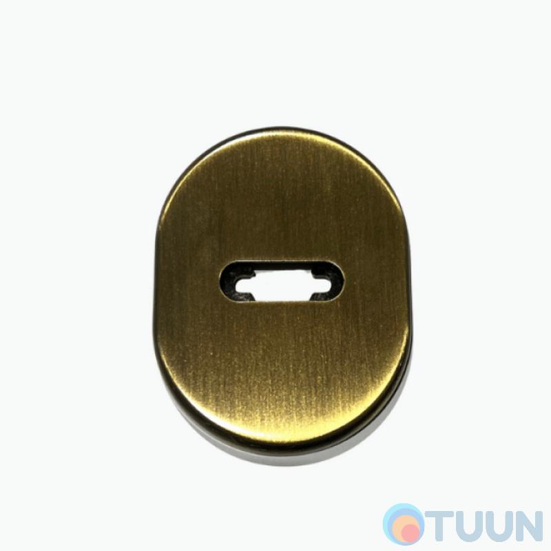 Cipierre, oval decorative cover for a key, bronze
